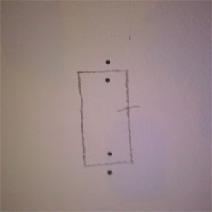 Patched drywall on wall